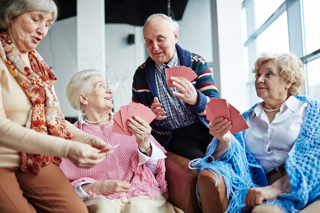 seniors playing cards together